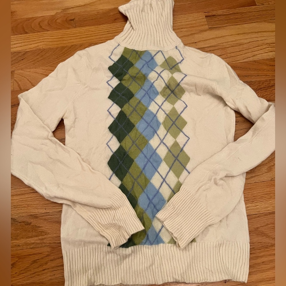 Cream and Argyle turtleneck.